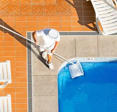 Pool Panthers technician in Boca Raton providing weekly cleaning and service